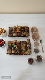 Grand Chatpata Celebration Box with two trays of lavashak rolls and bliss balls plus six masala cups